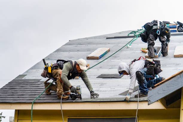 Professional Gutter Installation technician working in Roseville, OH